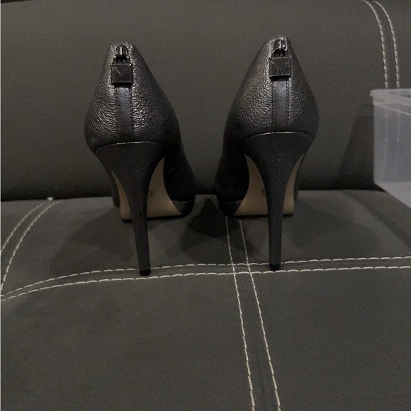 Silver Michael Kors pumps worn five times. Still like new. - Picture 2 of 4